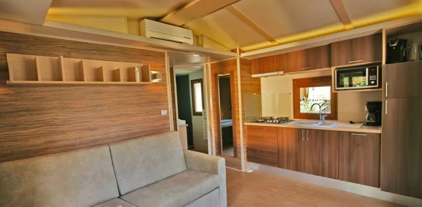 Living room with sofa bed - Tiki Hutte 2nd Beachrow 2 bedrooms