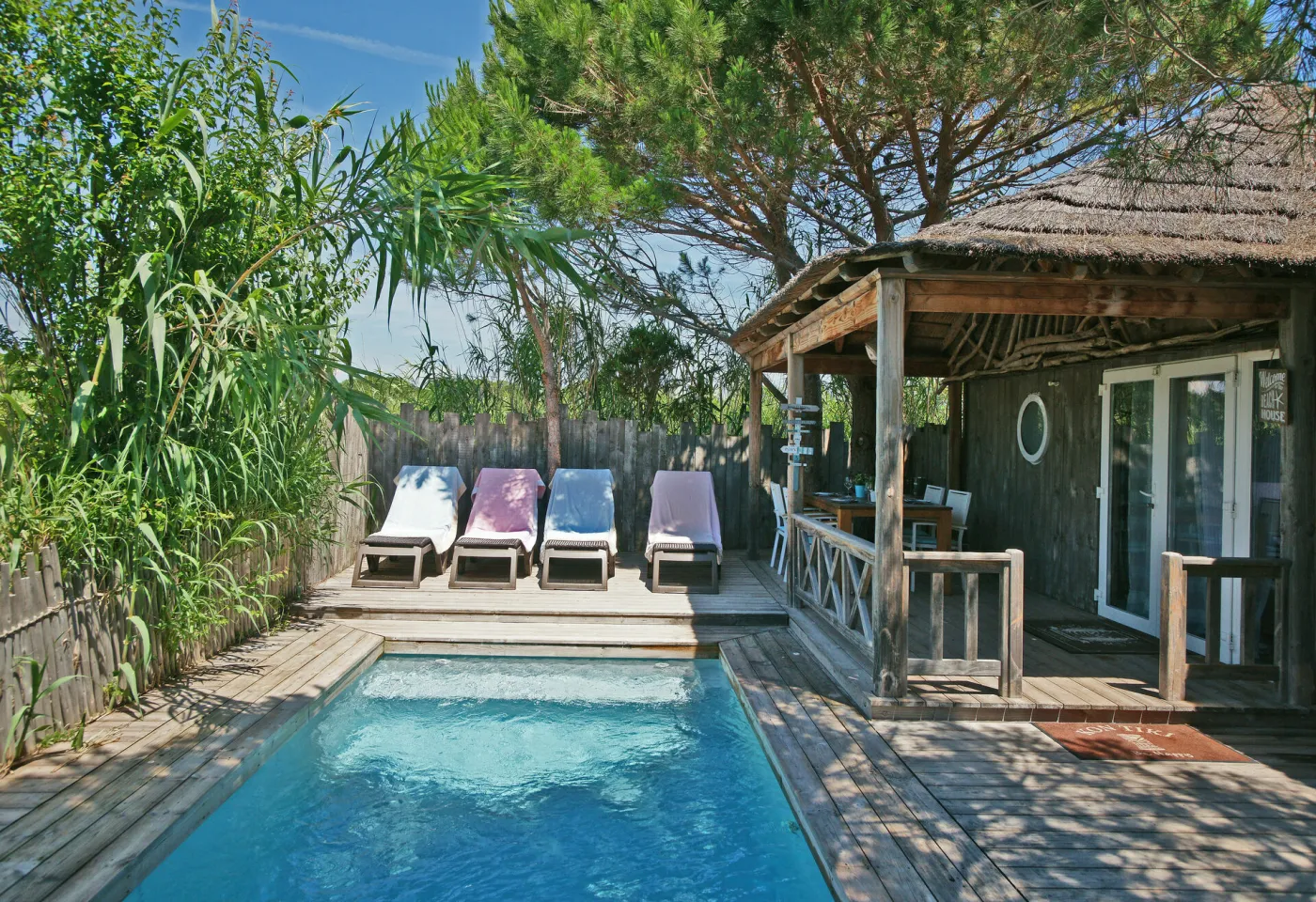 The perfect place to take a sunbath - Tiki Lounge Garden Pool 2 bedrooms