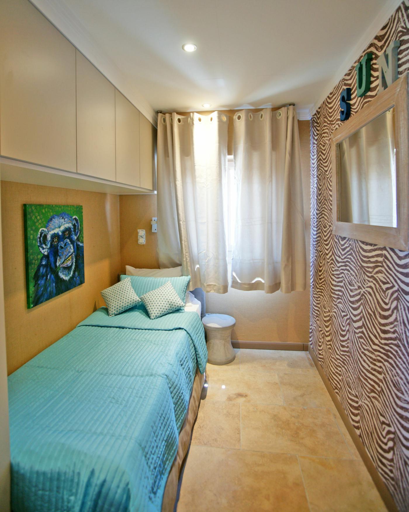 Twin bedroom (with sliding bed) of our Tiki Hutte - Seaview - Premium 2 bedrooms